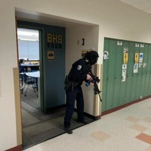 A Man Holding a Black Color Gun